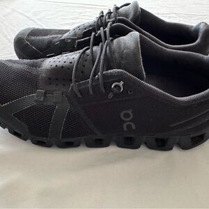 On Running woman’s Black Shoes